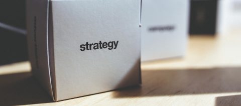 A paper box with the word strategy on it